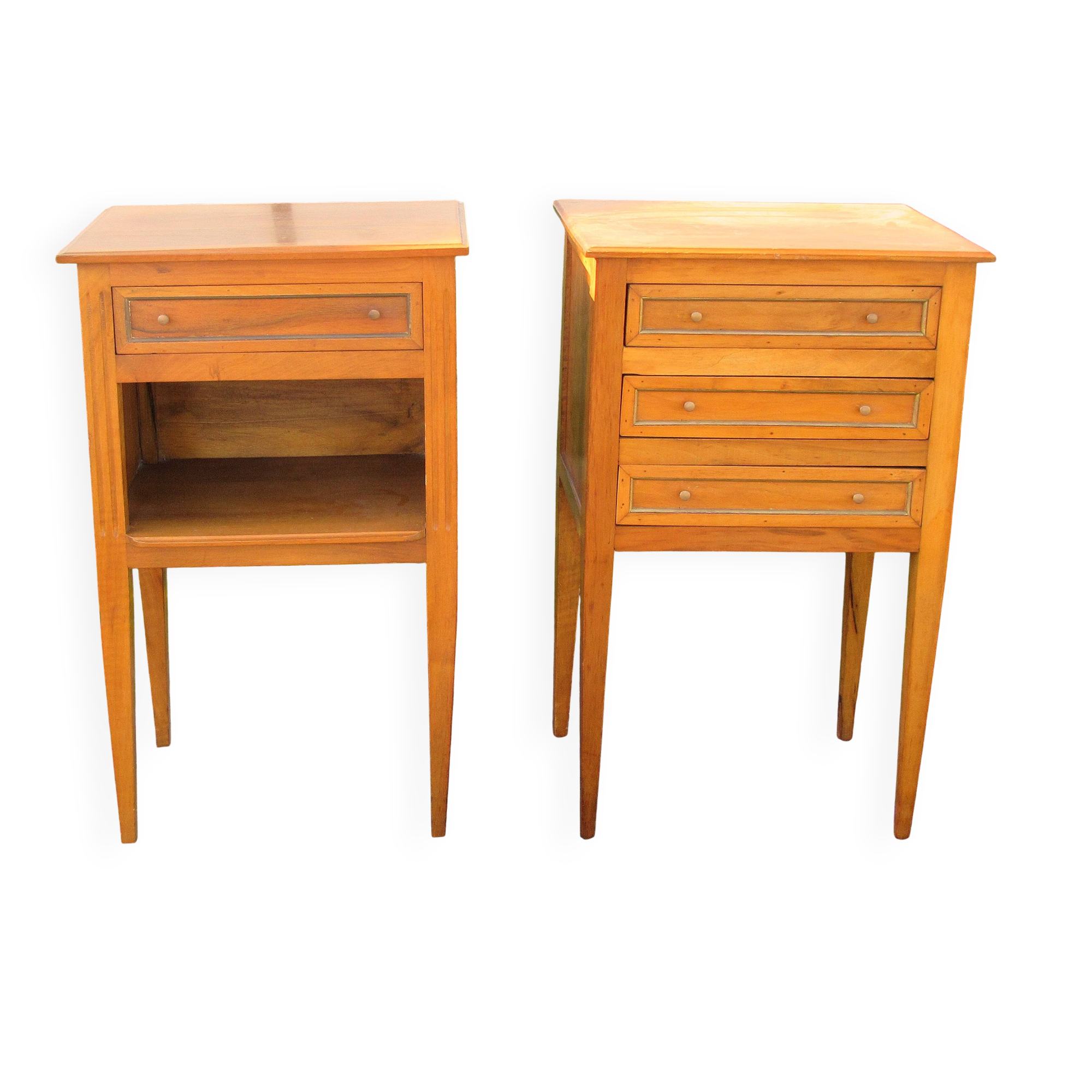 Pair of walnut bedside tables in Louis XVI style with brass inlay.