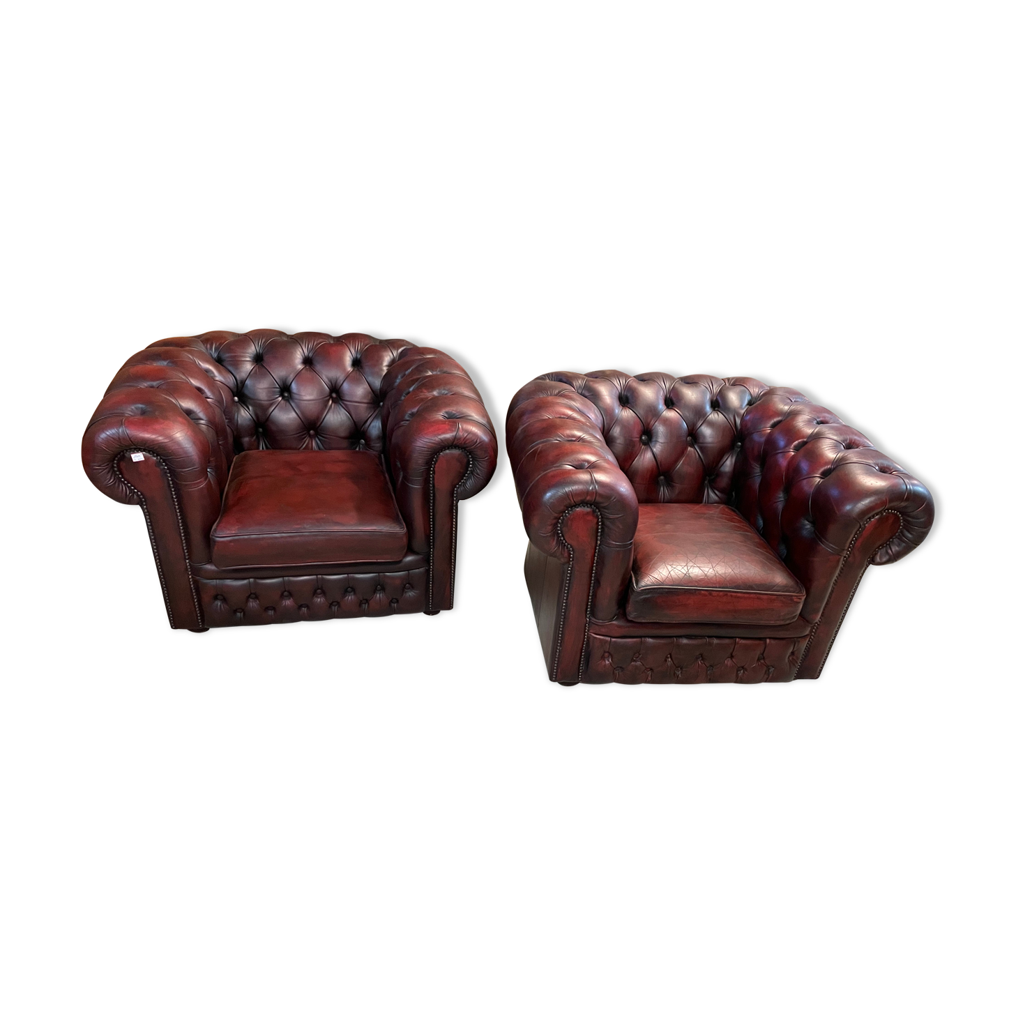 Paire de fauteuils chesterfield cuir