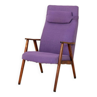 Scandinavian armchair with purple fabric