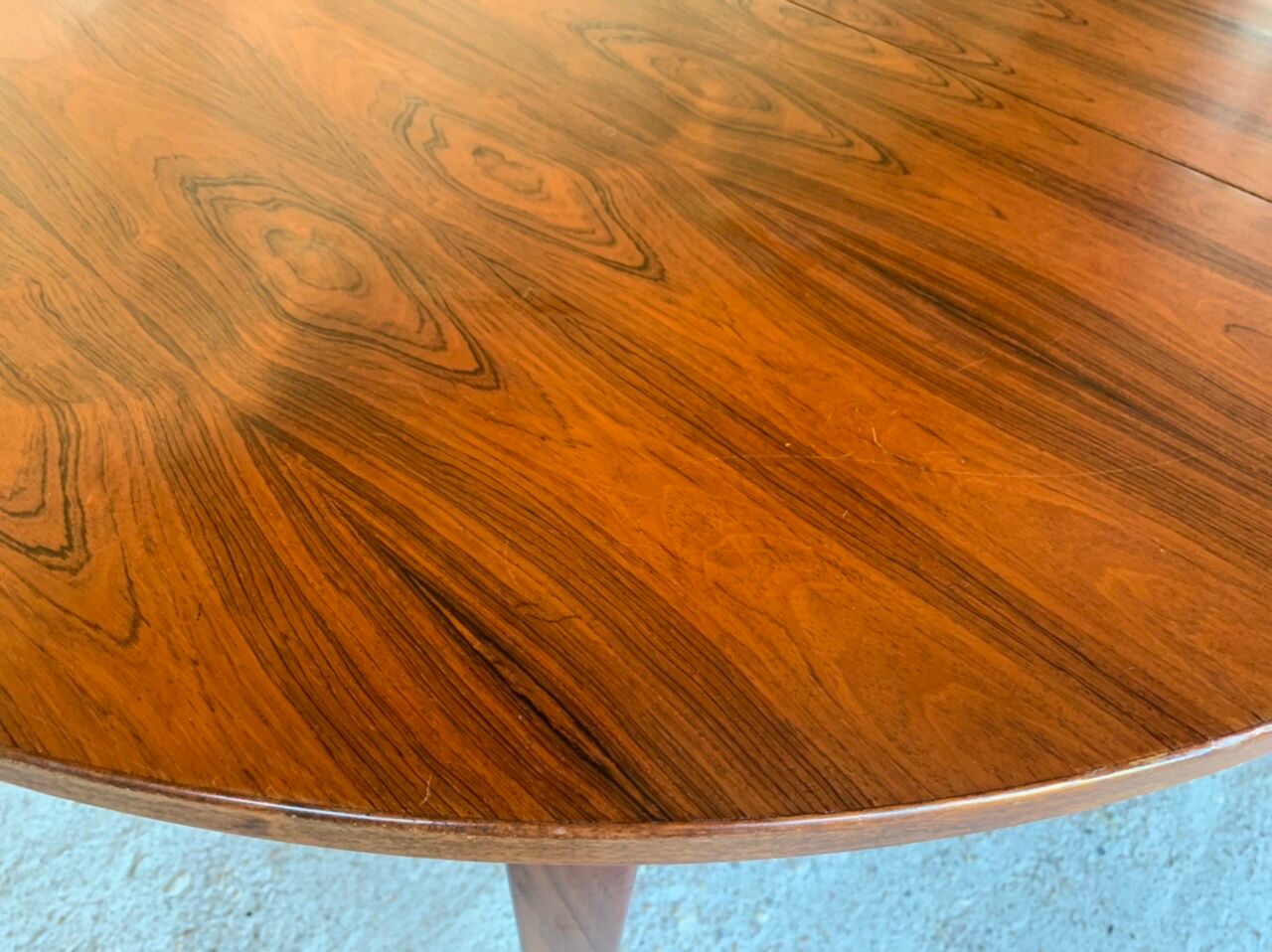 Extendable dining table with butterfly extensions in rosewood circa 60's