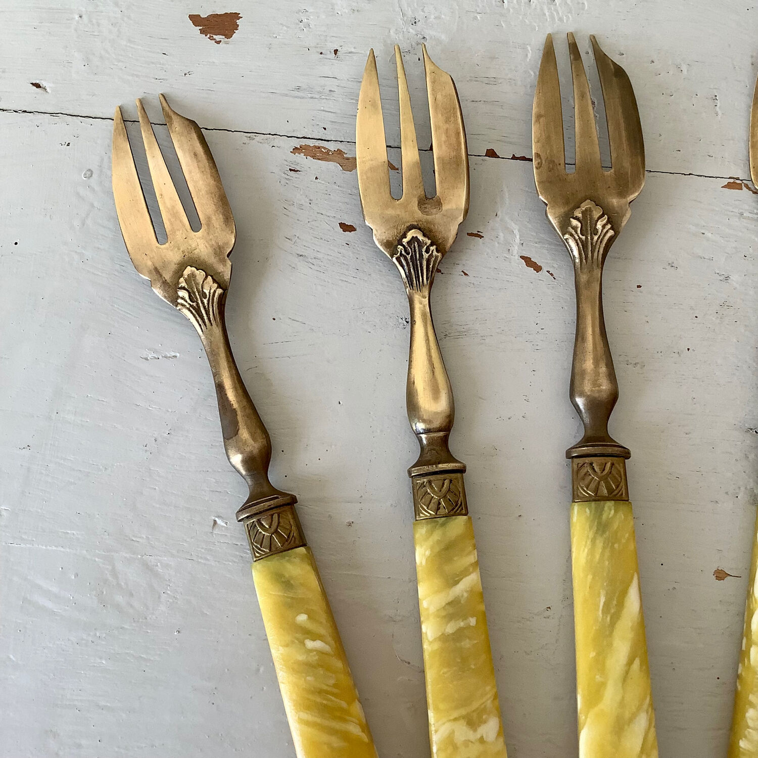 Brass and bakelite dessert cutlery