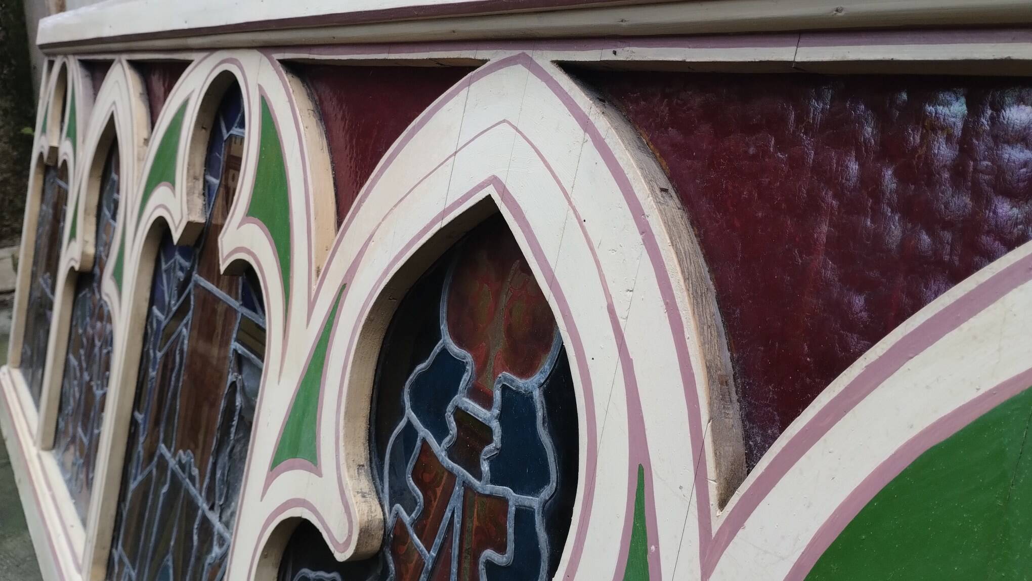 Large solid wood frame composed of 5 stained glass niches