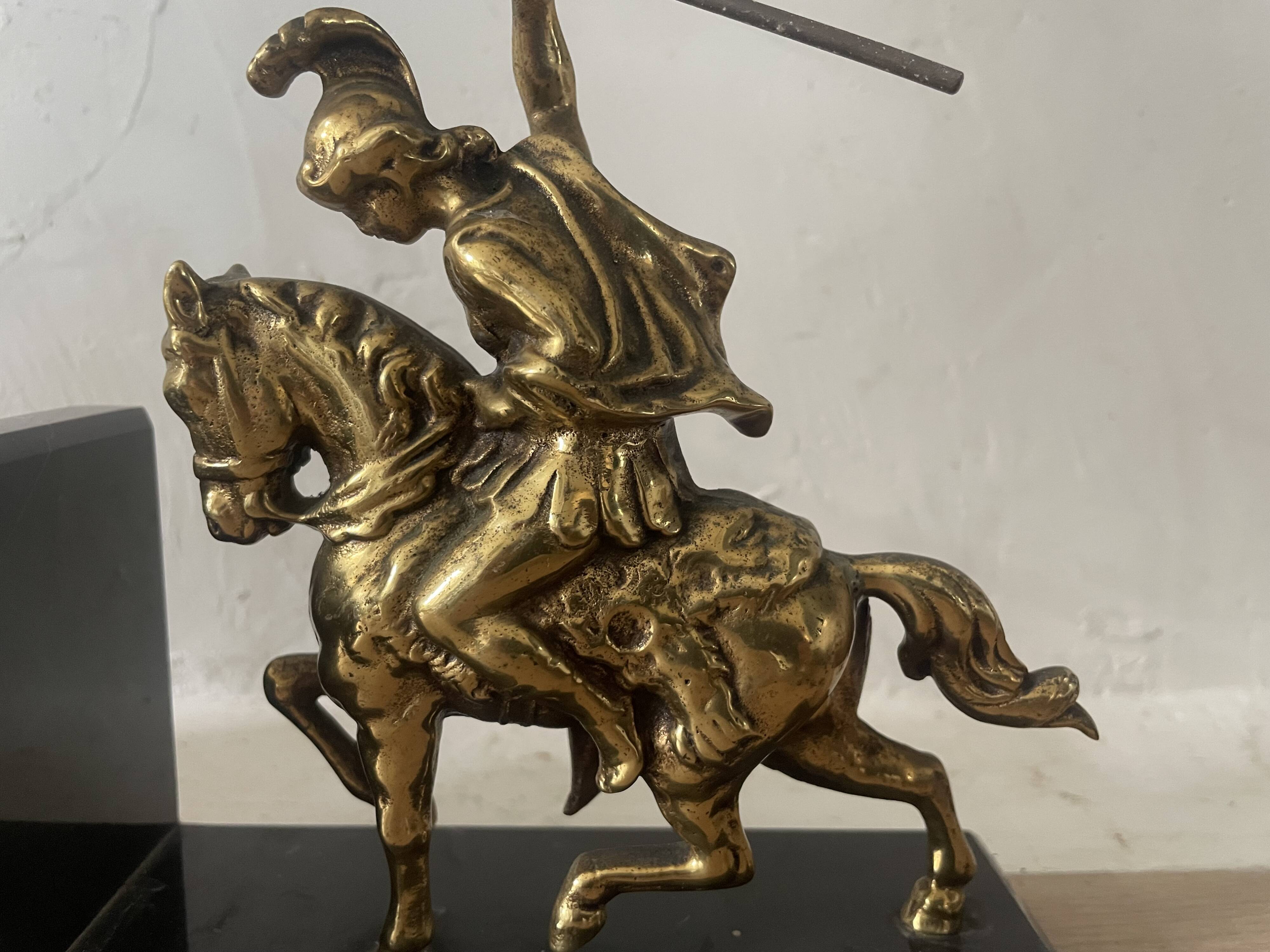 Pair of neo-classical Roman soldier bookends in marble and brass.
