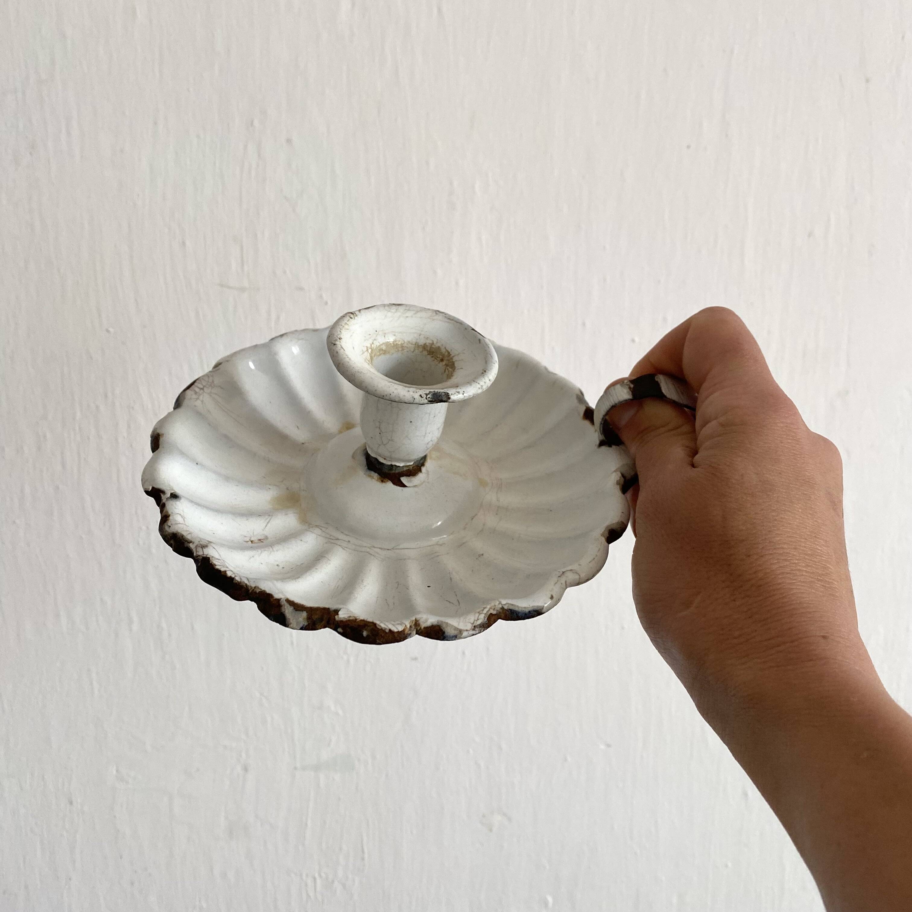 Antique enamelled sheet metal candle holder