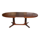 Baumann round oval extendable Scandinavian table in rosewood with 2 extensions.