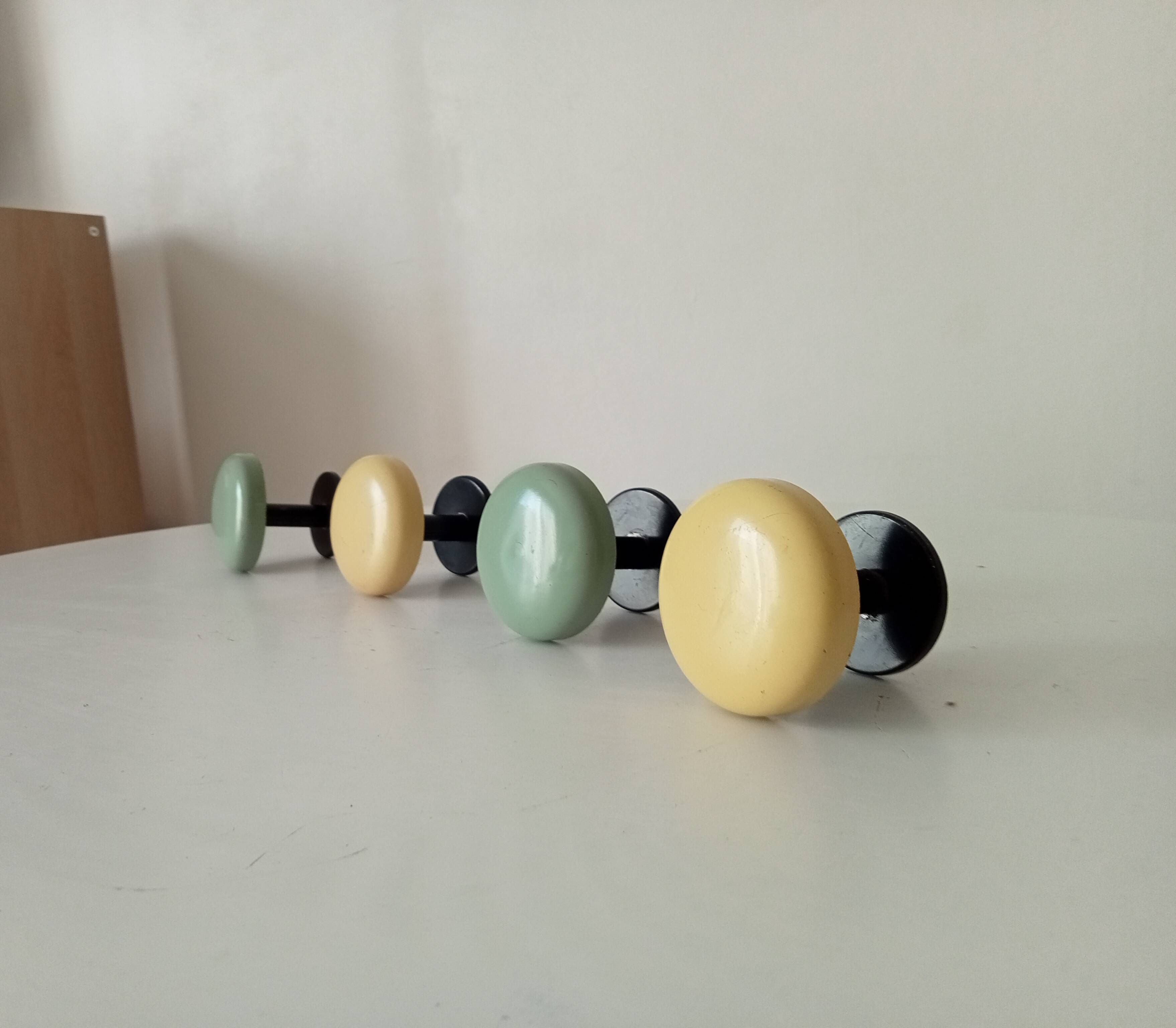 Set of 4 vintage coat hooks from the 1960s.