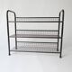70s 80s vintage 1970s metal shoe rack designed by Niels Gammel