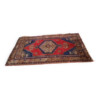 Handmade blue and red rug
