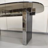 Chrome base diningroom table with smoked glass oval top