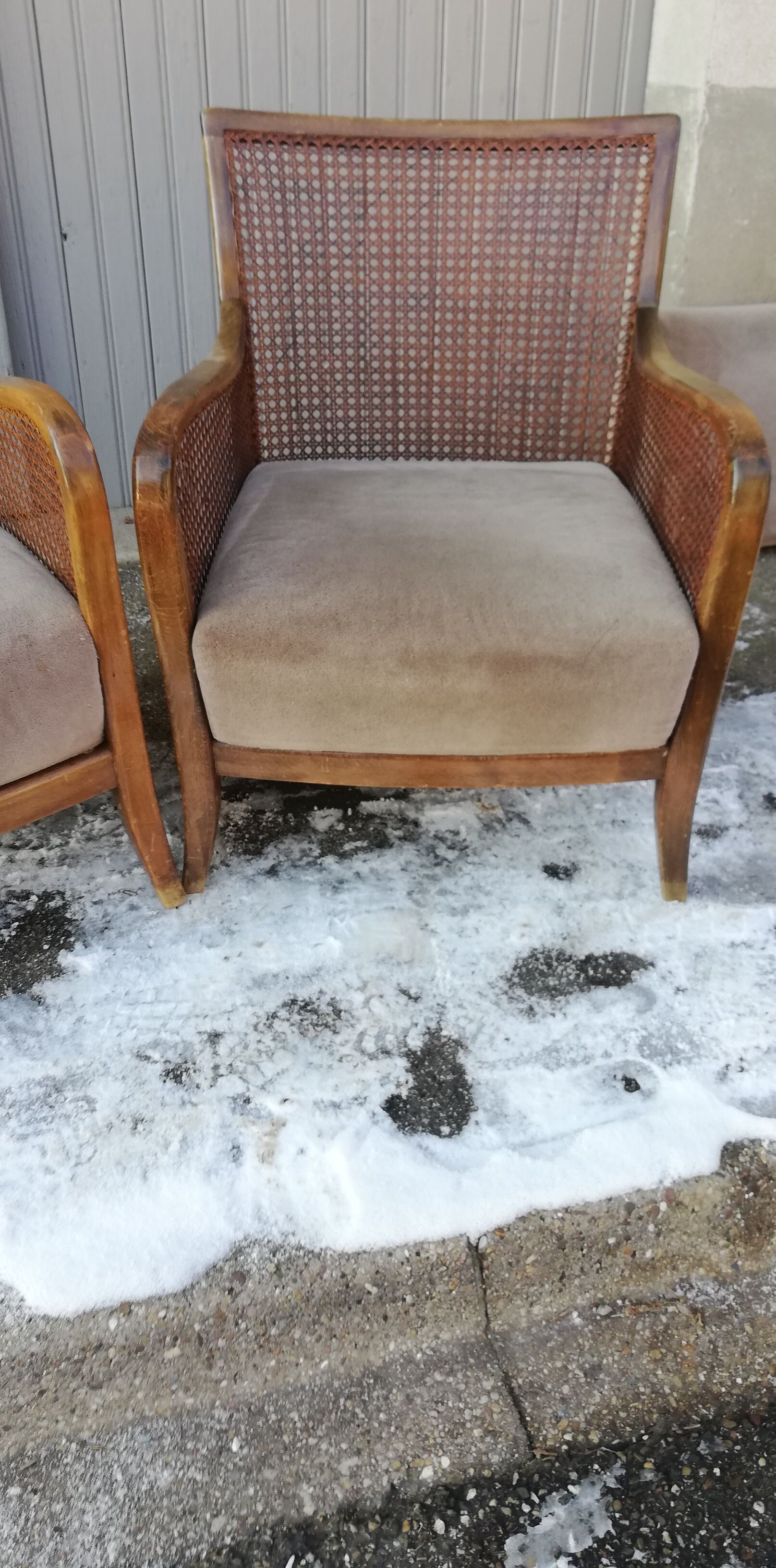 Pair of vintage cannage and fabric armchairs