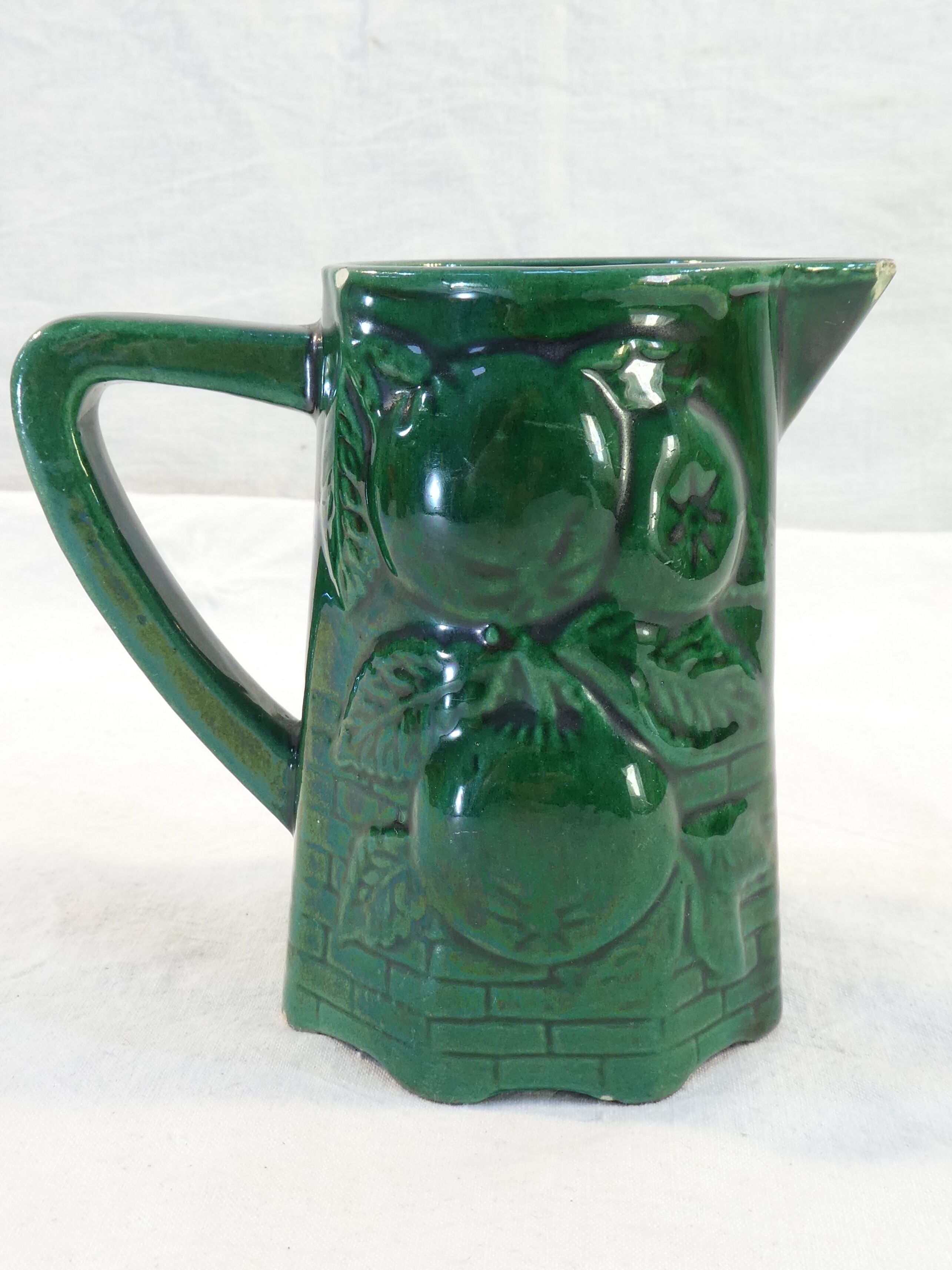 Pitcher vintage green slurry in faience of st clement with fruit
