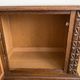 Pair of antique carved wooden bedside tables
