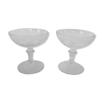 Pair of old glass champagne cups with facets
