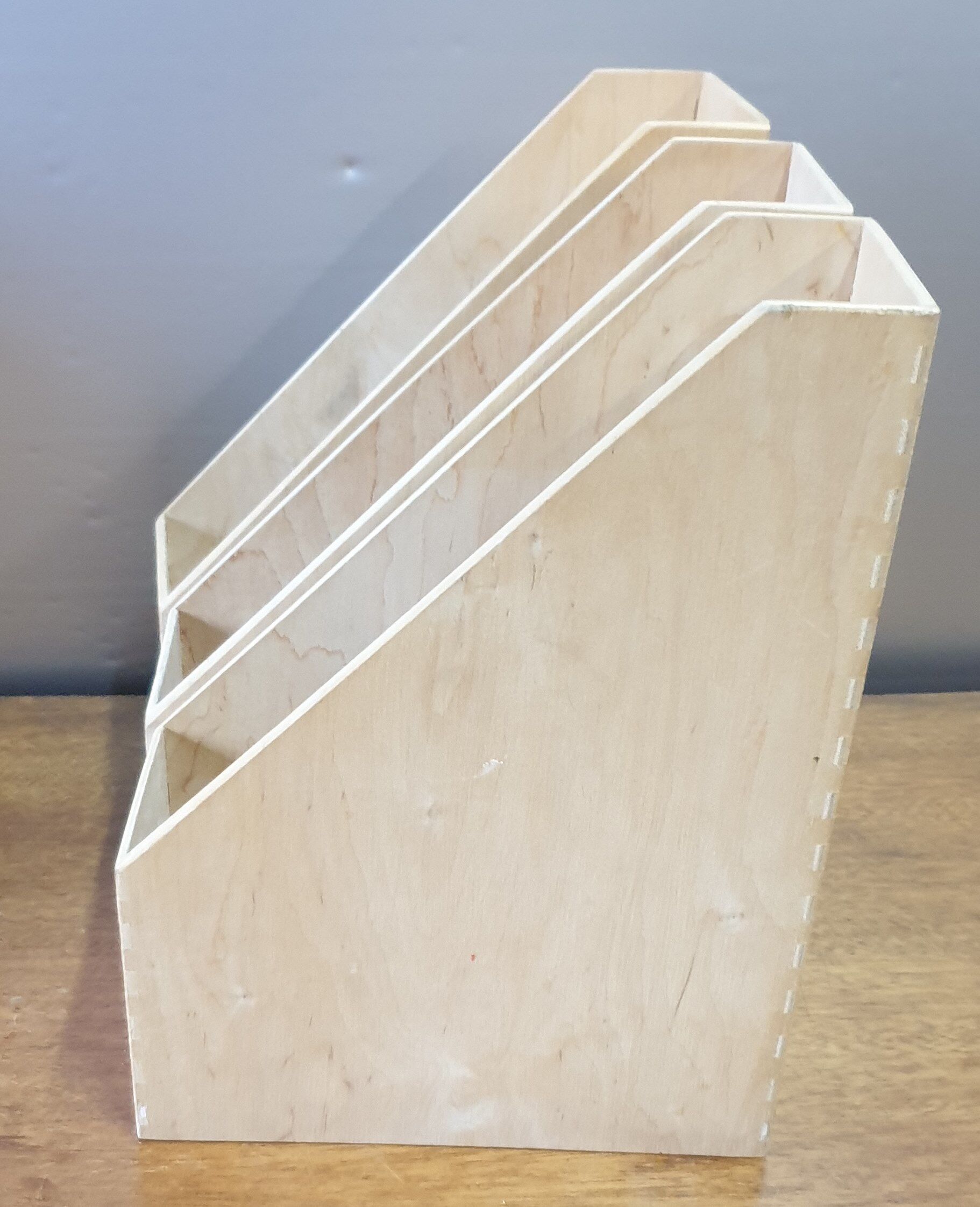 Trio of wooden filing cabinet racks