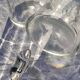 Two antique engraved glass bottles