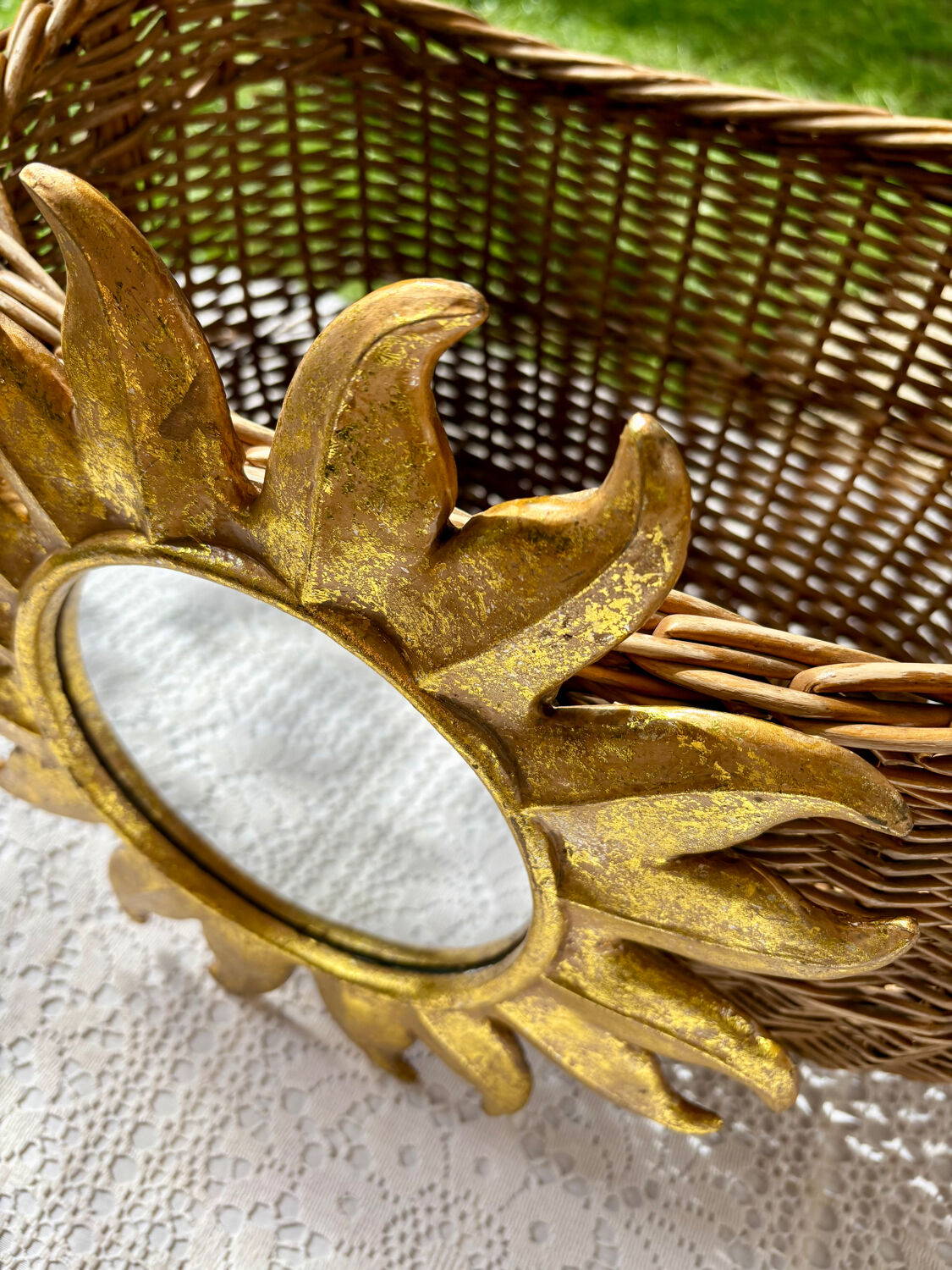 Golden resin sun mirror from the 1960s.