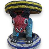 Zoomorphic beaded coffee table stool