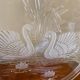 Glass plate decorated with swans