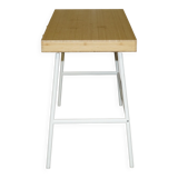 Small bamboo desk with three drawers.