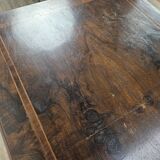 Walnut coffee table with crossed legs