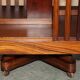 Sheraton-style rotating library table in walnut and satinwood.