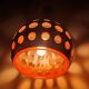 Raak three-light space age orange pendant lamp, 1970s, Netherlands