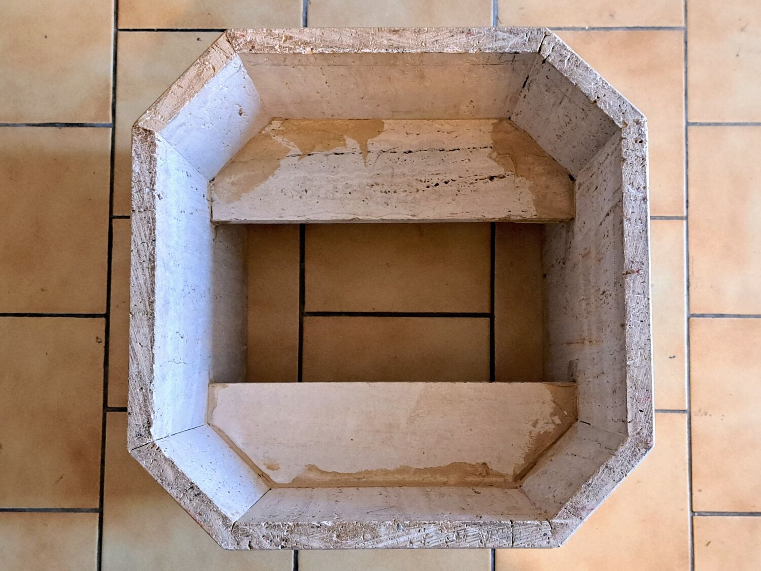 Travertine and brass coffee table