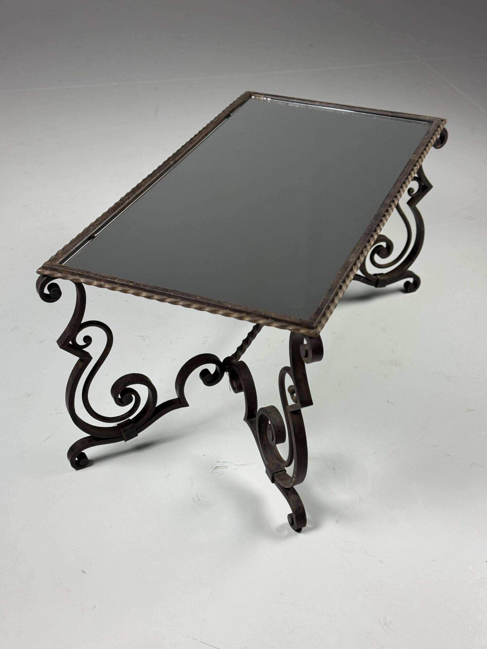 Wrought iron coffee table with mirror glass
