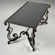 Wrought iron coffee table with mirror glass