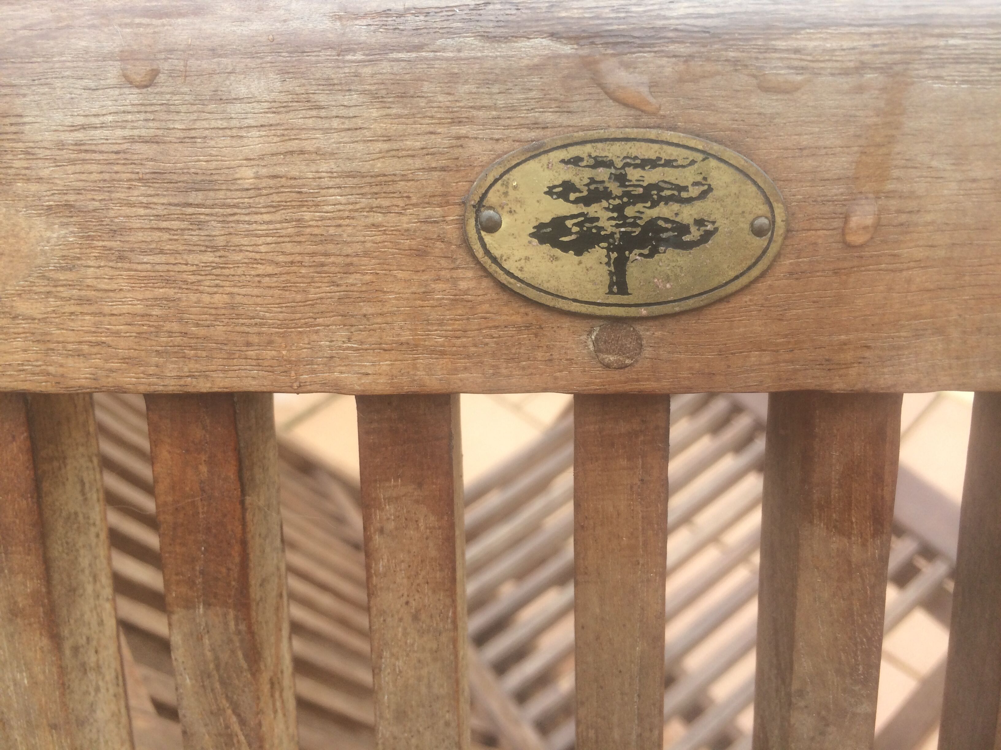 2 old teak chairs. Brand plate.