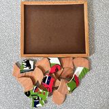 Wooden frame puzzle from the 1940s/50s depicting a caravan campsite.