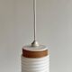 Opaline corrugated tube suspension