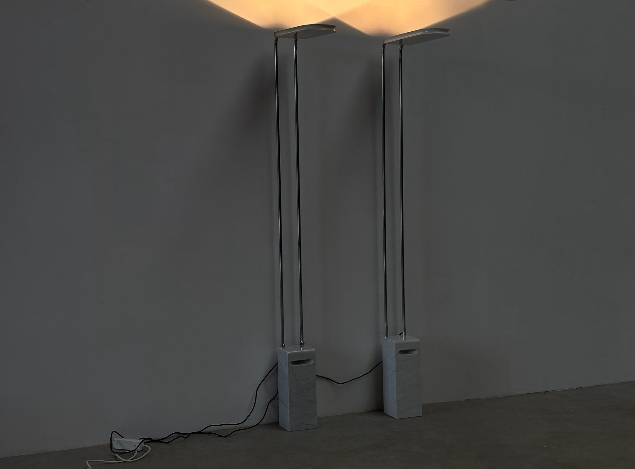 Pair of Skipper floor lamps by Bruno Gecchelin