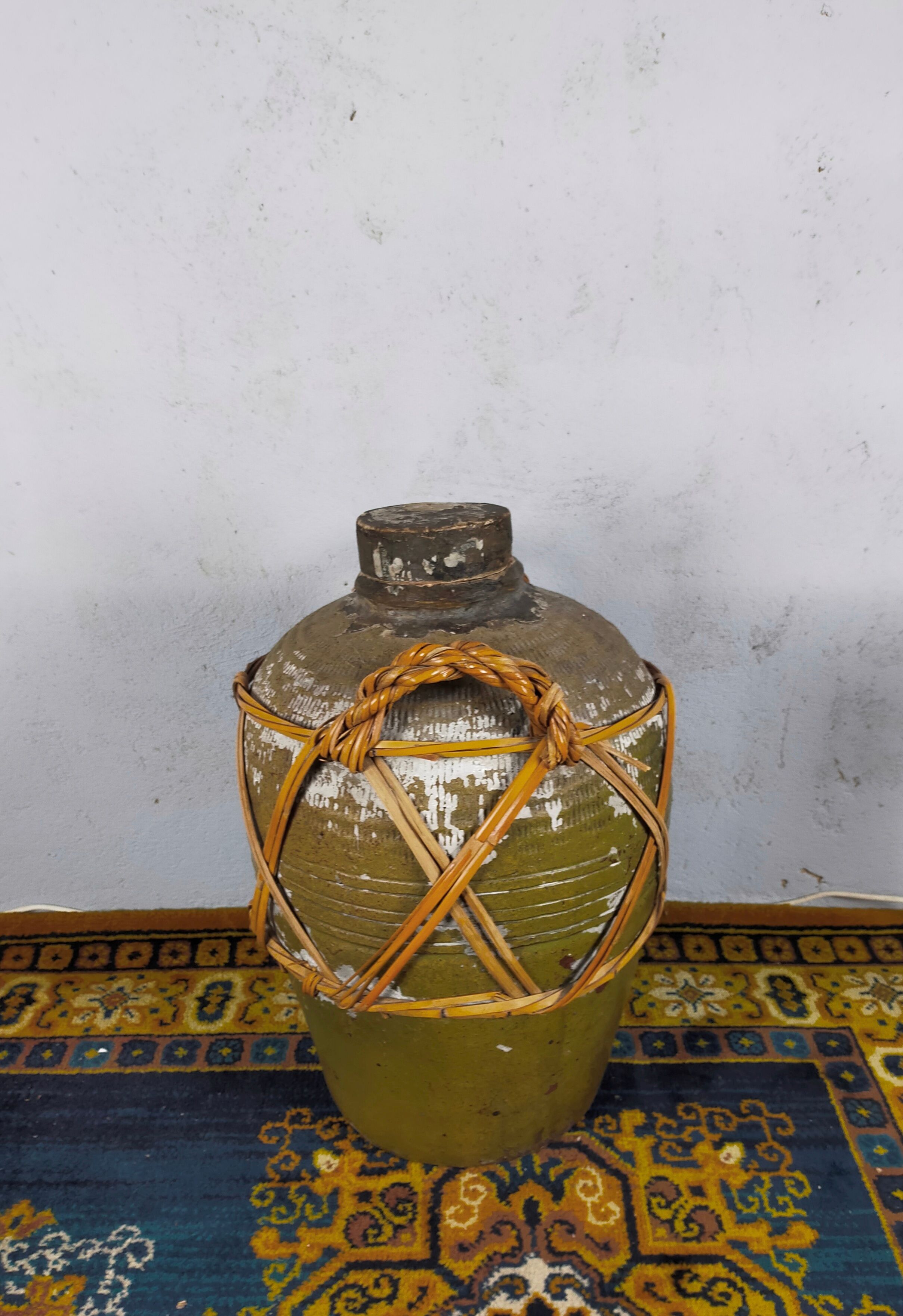19th century terracotta and rattan jar