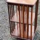 Art Deco style revolving bookcase in walnut and oak