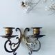 Old wall candle holder in golden brass