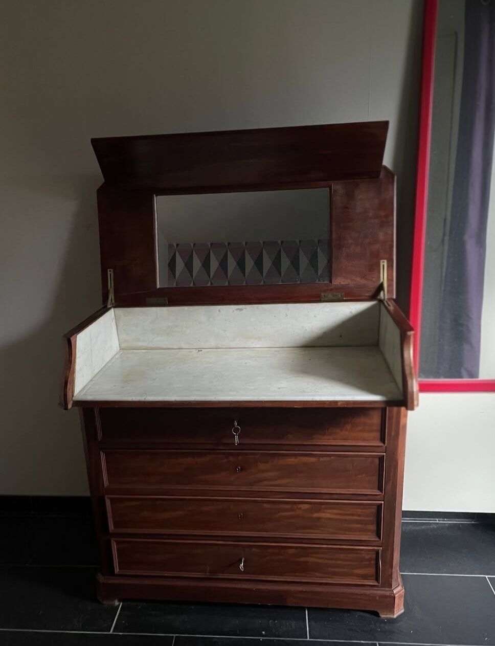 Vintage wooden toilet commode with marble top.