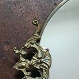 Antique mirror, oval with brass crest