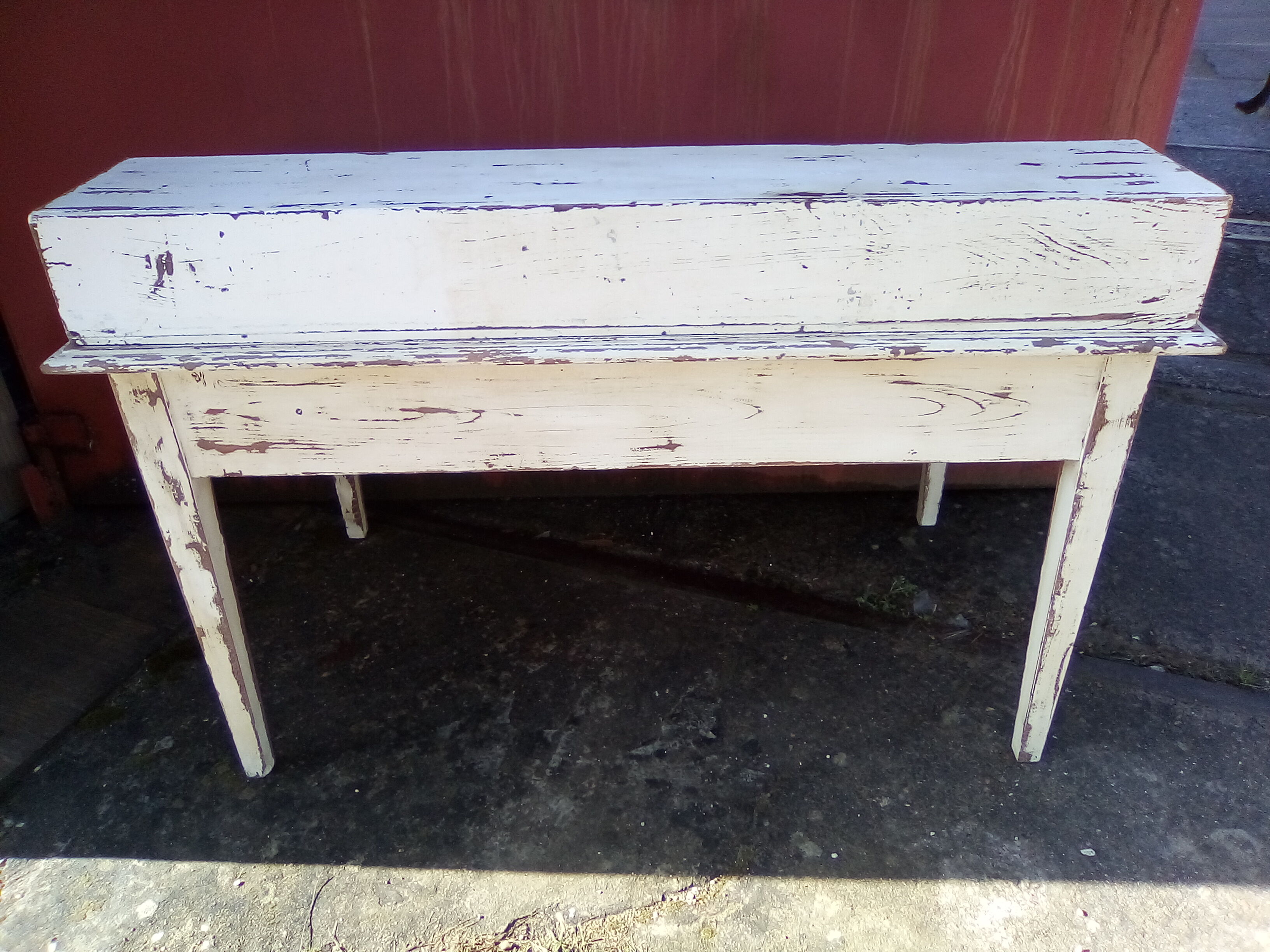 Large wooden desk with patinated bleacher