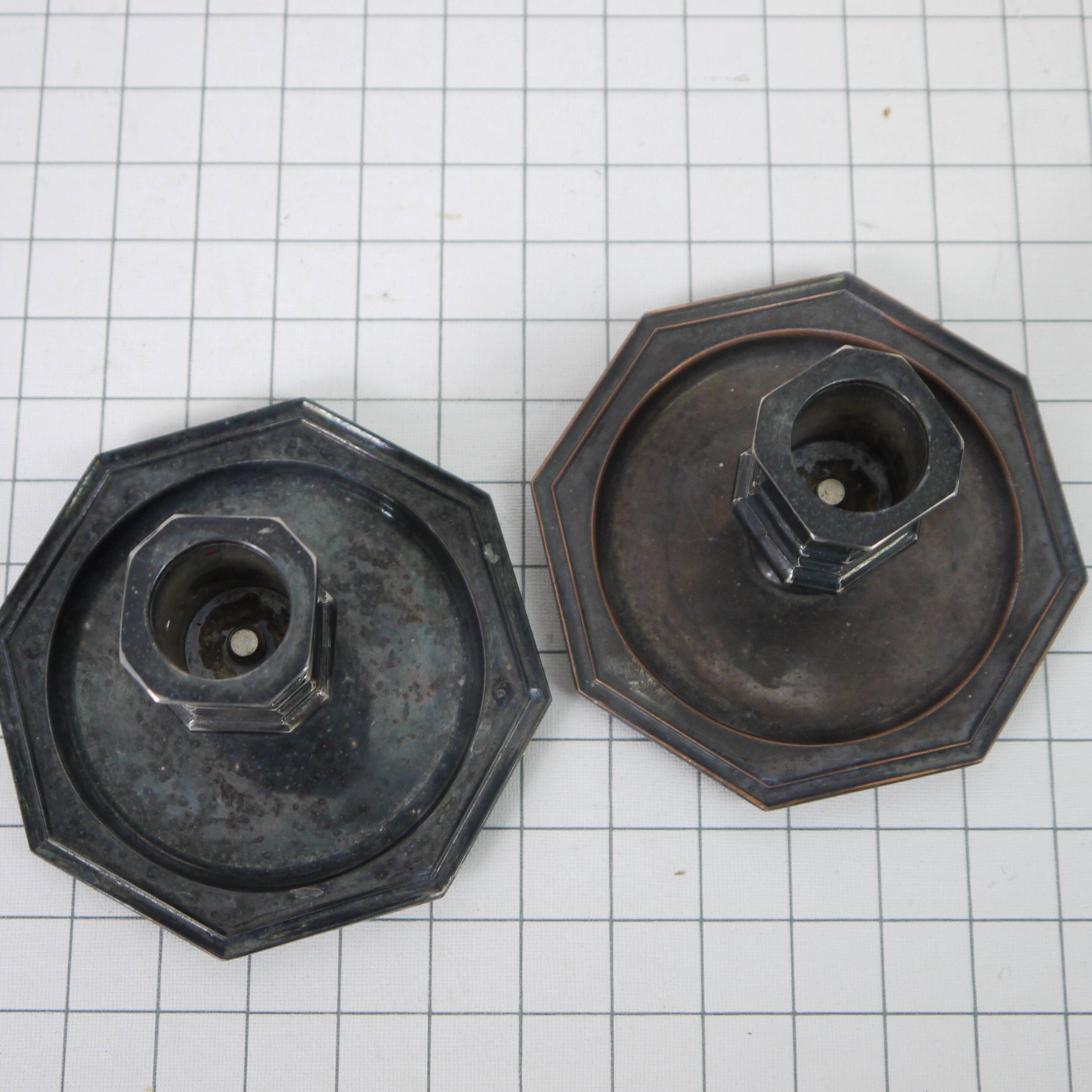 Pair of metal candlesticks