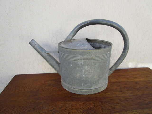 Old zinc watering can
