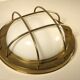 Brass "porthole" wall lamp