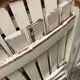 Five wooden garden armchairs