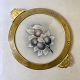 Art Nouveau plate in earthenware with a brass frame
