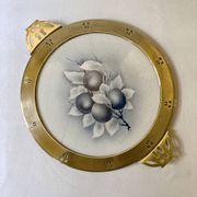 Art Nouveau plate in earthenware with a brass frame