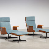 Pair of modernist teak lounge chairs and poufs 1960
