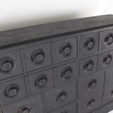Blackened wooden chest of drawers