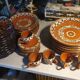 Terracotta service decorated with psychedelic drips