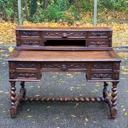 19th-century Renaissance carved oak desk with chair