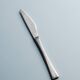 GUY DEGRENNE STAINLESS STEEL CUTLERY SET, 1970s